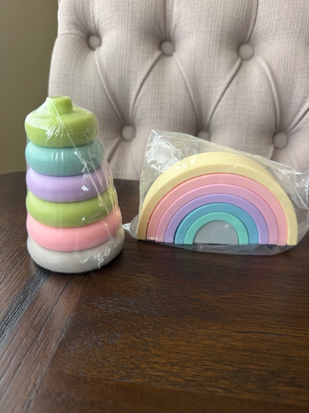 NWOT baby silicon rainbow and stacking tower